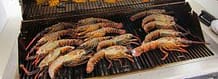 Sizzling grilled prawns perfect for private chef dining in Australia.