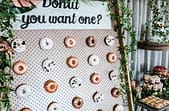 Decorative doughnuts on wall display for event catering and private chef experiences in Australia.