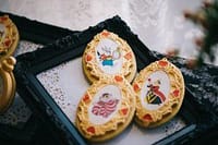 Delicious decorated cookies with festive designs for special events or celebrations.