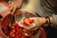 Elegant cocktail with fresh strawberries for luxury private dining experience in Australia.