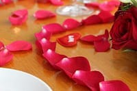 Elegant rose and petal decorations for romantic dining experiences in Melbourne.