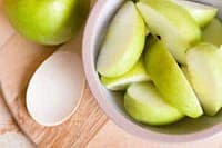 Fresh green apple slices for healthy gourmet meals with Your Private Chef in Australia.