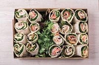 Fresh gourmet wrap platter with assorted fillings for private chef catering in Australia.