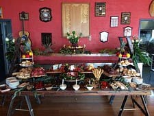 Gourmet buffet setup with fresh dishes and elegant decor for private chef events in Australia.