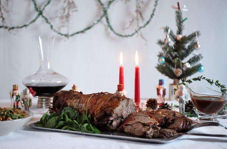 Elegant Christmas feast prepared by Your Private Chef in Australia, featuring roast meat, festive decorations, and holiday atmosphere.