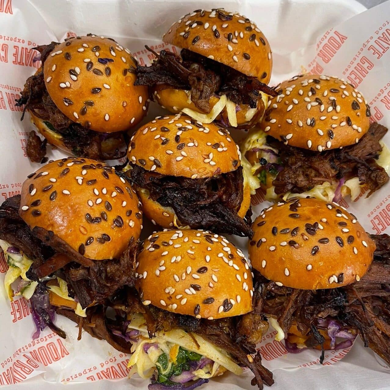 Brioche mini burger with pulled beef brisket cola bbq sauce & spiced slaw
