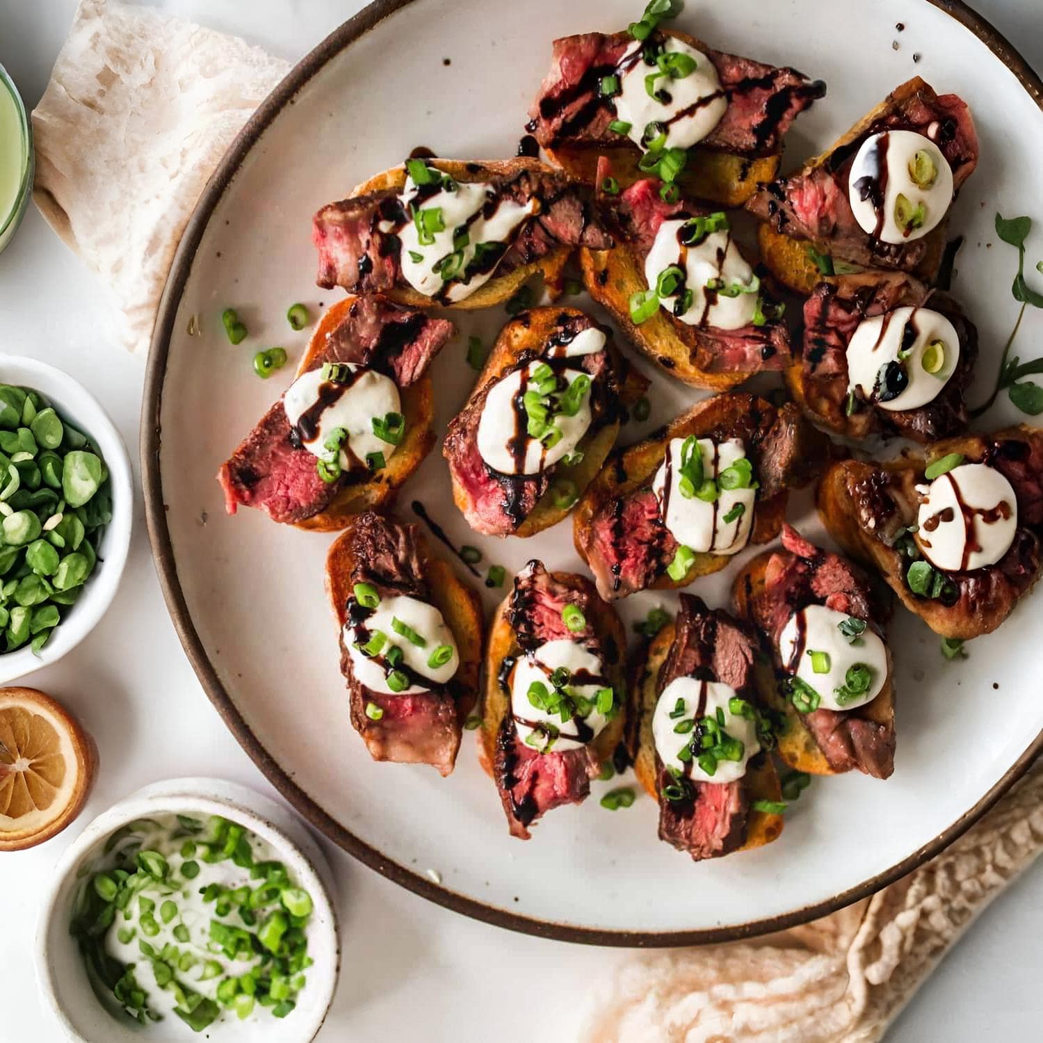 Rare beef tartare salsa Verde, truffled mayo on crostini (df)